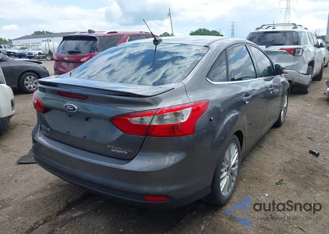 2014 Ford Focus Titanium from USA, damaged, VIN 1FADP3J25EL154679
